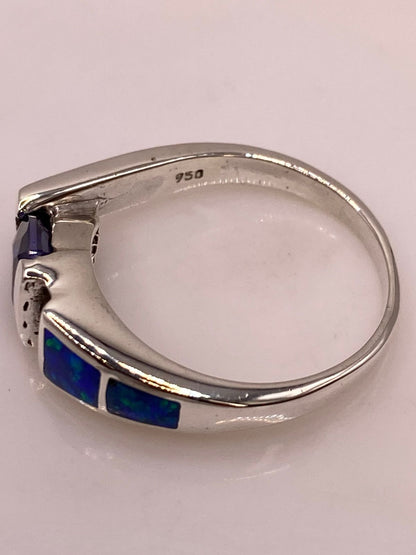 Anillo Solitario de Plata Ley 950 con Ópalo de Fuego y Zirconia Morada, sello de autenticidad Plata Ley .925