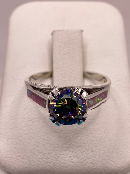 Anillo Solitario de Plata Ley 950 con Ópalo de Fuego y Zirconia Multicolor en báscula mostrando peso