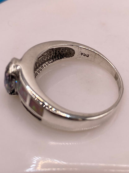 Anillo Solitario de Plata Ley 950 con Ópalo de Fuego y Zirconia Multicolor, sello de autenticidad Plata Ley .925