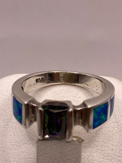 Anillo Solitario de Plata Ley 950 con Ópalo de Fuego y Zirconia Multicolor, sello de autenticidad Plata Ley .925