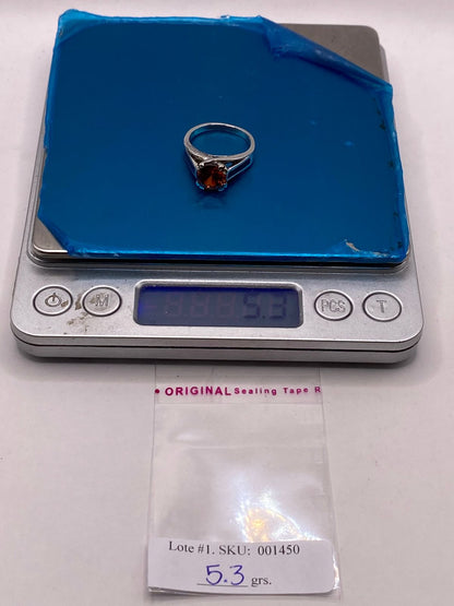 Anillo Solitario de Plata Ley 950 con Ópalo de Fuego y Zirconia Naranja, peso en gramos (báscula)
