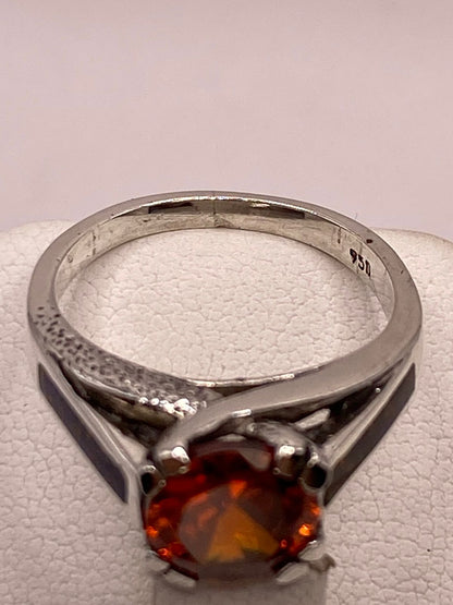 Anillo Solitario de Plata Ley 950 con Ópalo de Fuego y Zirconia Naranja, sello de autenticidad Plata Ley .925