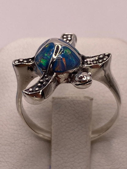 Anillo Tortuga Marina en Plata Ley 950 con Ópalo de Fuego, vista de detalle