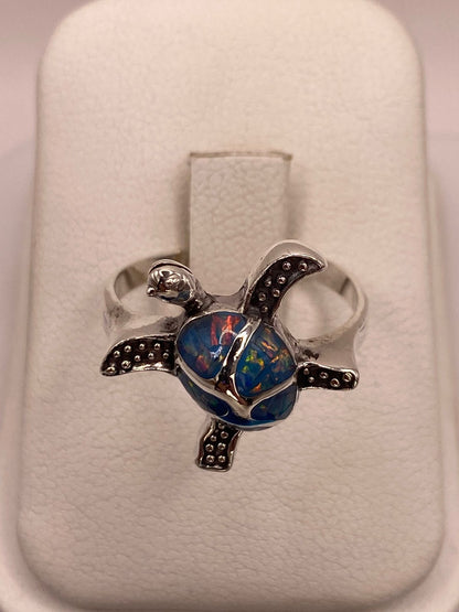 Anillo Tortuga Marina en Plata Ley 950 con Ópalo de Fuego, vista frontal