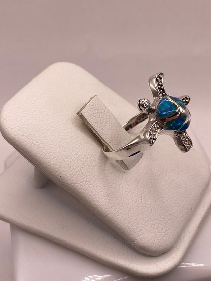 Anillo Tortuga Marina en Plata Ley 950 con Ópalo de Fuego, vista lateral