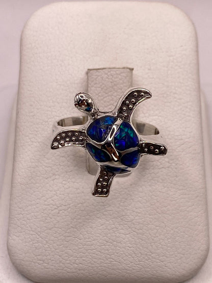 Anillo Tortuga Marina de Plata Ley 950 con Ópalo de Fuego — vista lateral