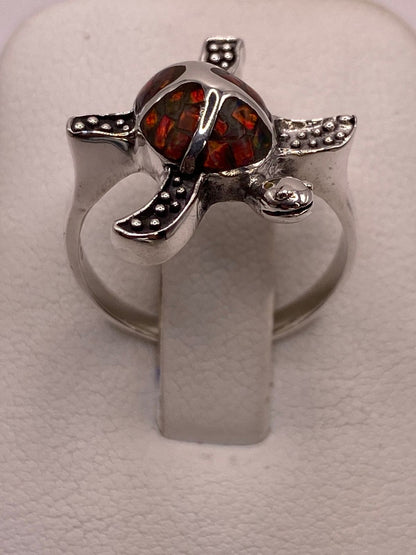 Anillo Tortuga Marina de Plata Ley 950 con Ópalo de Fuego Multicolor, vista lateral