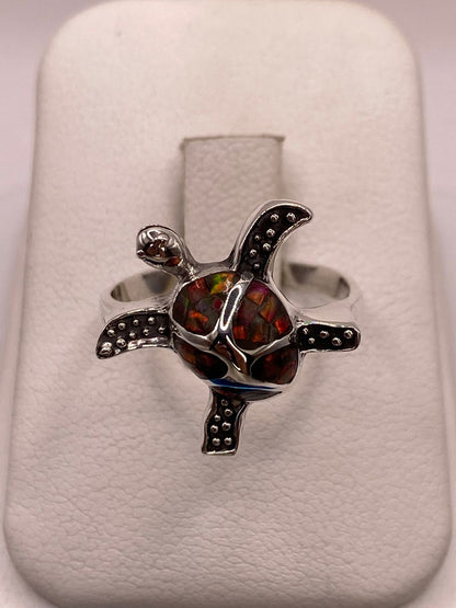 Anillo Tortuga Marina de Plata Ley 950 con Ópalo de Fuego Multicolor, vista frontal