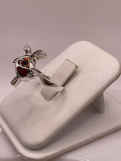 Anillo Tortuga Marina de Plata Ley 950 con Ópalo de Fuego Multicolor, vista frontal