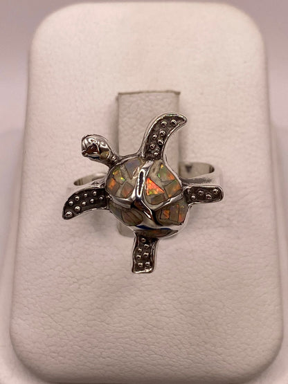 Anillo Tortuga Marina de Plata Ley 950 con Ópalo de Fuego Tornasol — vista lateral