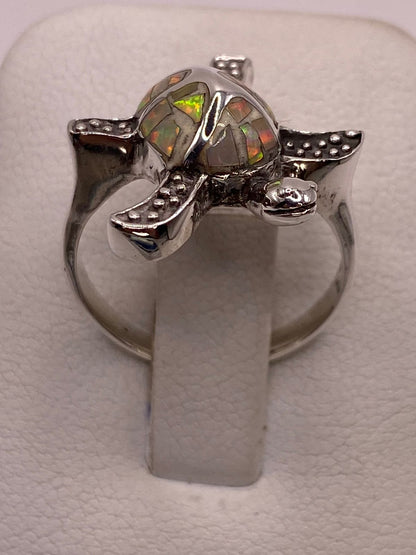 Anillo Tortuga Marina de Plata Ley 950 con Ópalo de Fuego Tornasol, vista lateral