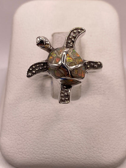 Anillo Tortuga Marina de Plata Ley 950 con Ópalo de Fuego Tornasol, vista frontal