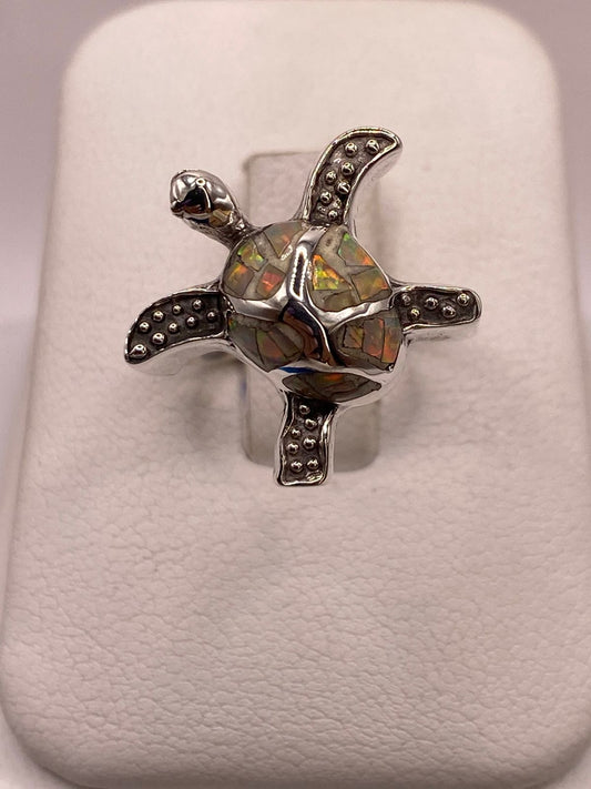 Anillo Tortuga Marina de Plata Ley 950 con Ópalo de Fuego Tornasol, vista frontal