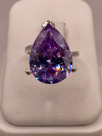 Anillo de Zirconia Púrpura Gigante Plata Ley 925 — ángulo diagonal