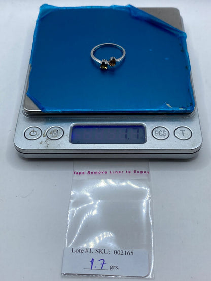 Anillo con Zirconias Color Ámbar en Plata 925, peso en gramos (báscula)