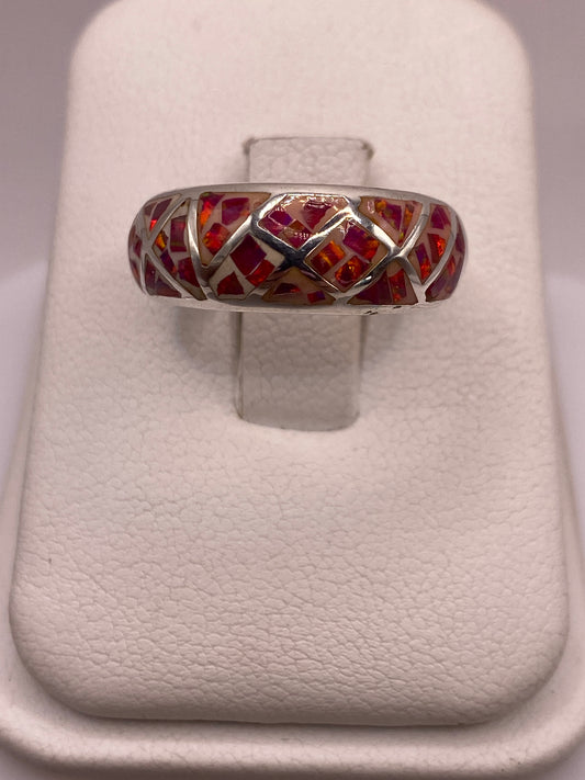 Anillo de plata .950 con ópalo de fuego multicolor que brilla en rojo, naranja y dorado