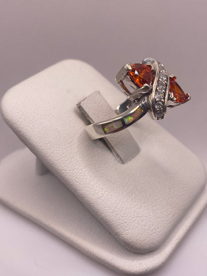 Vista frontal del anillo cocktail de plata .925 con piedra naranja fuego