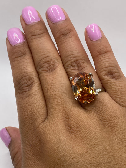 Anillo ajustable de plata en fondo blanco, mostrando sello .925 MEXICO
