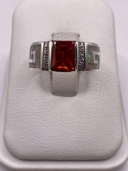 Anillo de plata .950 con ópalo de fuego multicolor en estuche blanco