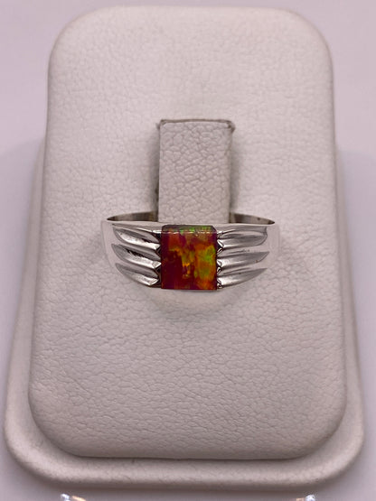 Anillo de plata .950 con ópalo de fuego rosa en estuche blanco