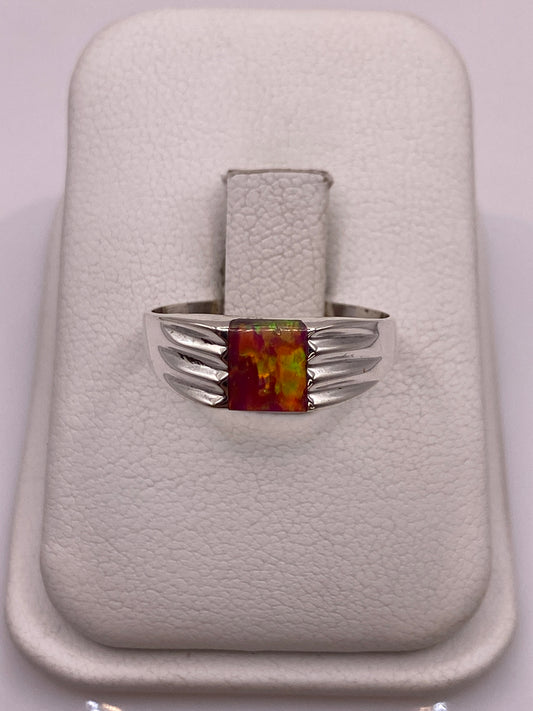 Anillo de plata .950 con ópalo de fuego rosa en estuche blanco