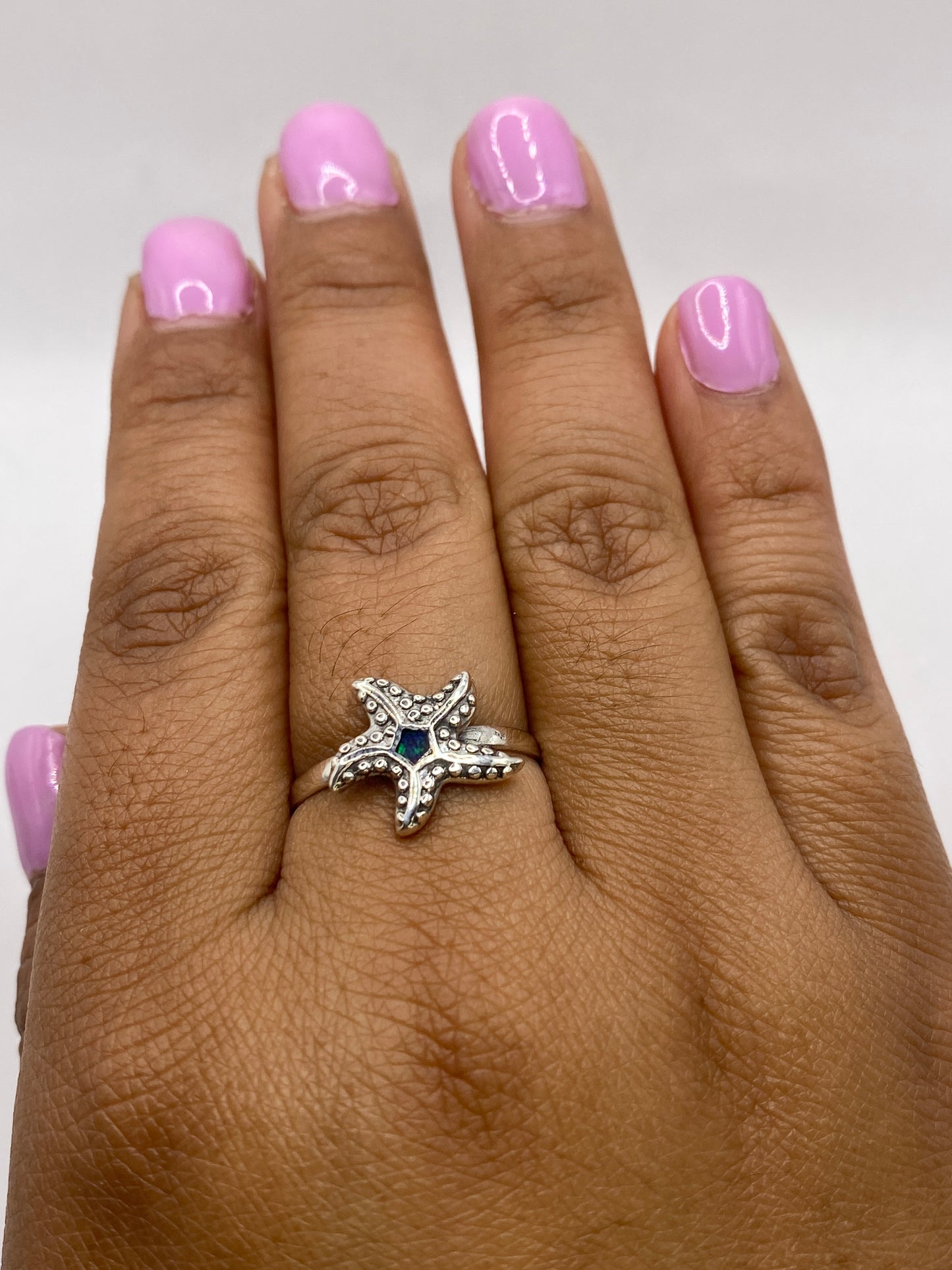 Lateral del anillo estrella de mar en plata auténtica de Taxco con sello 925