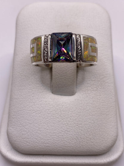 Anillo de plata .950 con ópalo de fuego amarillo en bandas arquitectónicas, vista frontal en estuche