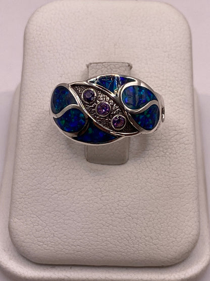 Anillo de plata .950 con ópalo de fuego multicolor en estuche blanco