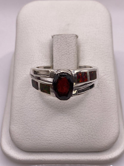 Anillo de plata .950 con ópalo de fuego multicolor en estuche blanco