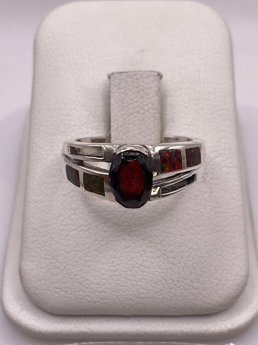 Anillo de plata .950 con ópalo de fuego multicolor en estuche blanco