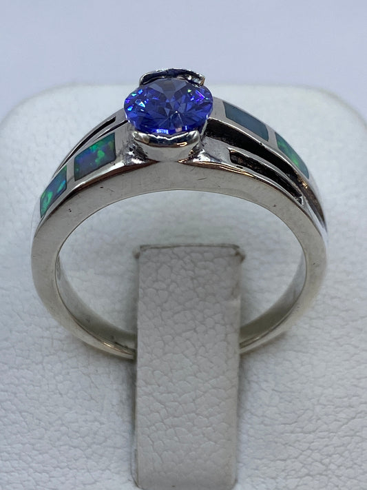 Anillo de plata .950 con ópalo de fuego multicolor en tono solitario