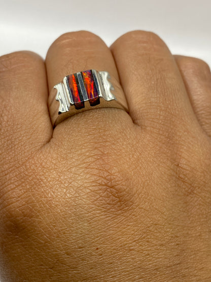 Anillo sobre placa de pesaje mostrando 9 gramos y sello .925