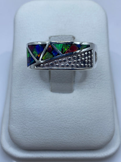 Anillo de plata .950 con ópalo de fuego multicolor engastado en diseño geométrico
