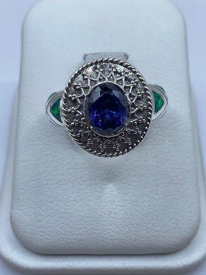 Anillo solitario de plata .950 con ópalo de fuego verde limón en estuche blanco
