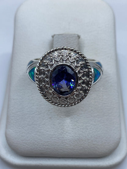 Anillo de plata .950 con ópalo de fuego azul cielo, diseño arquitectónico