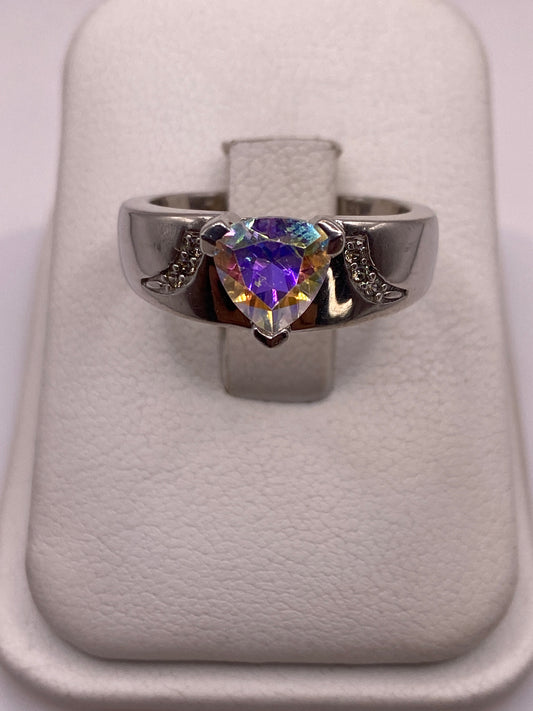 Anillo solitario de plata .925 con circonia multicolor en caja de presentación blanca