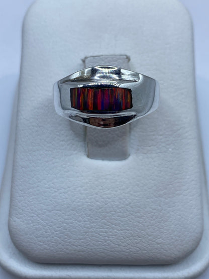 Anillo de plata .950 con ópalo de fuego multicolor en tonos rojos y naranjas