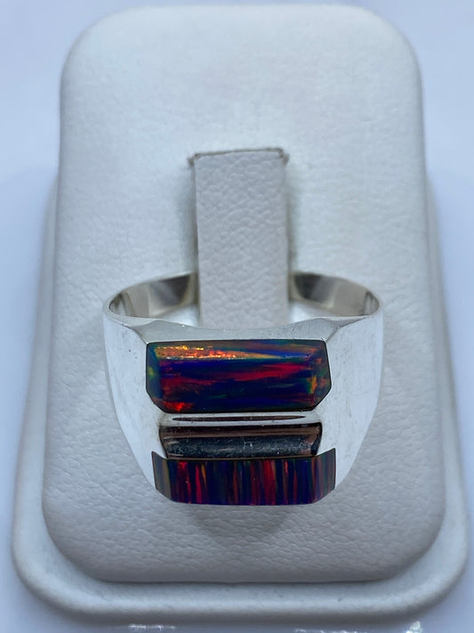 Anillo de plata .925 con ópalo de fuego multicolor en caja de presentación