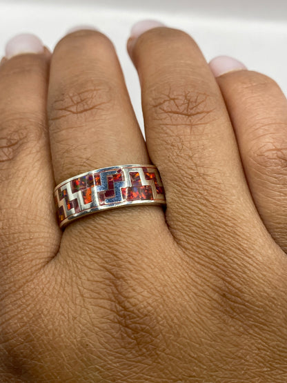 Anillo geométrico prehispánico sobre fondo blanco mostrando el sello .950