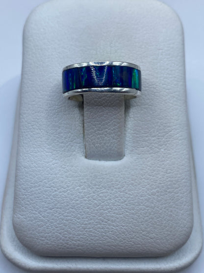 Anillo de plata .950 con ópalo de fuego azul en estuche blanco
