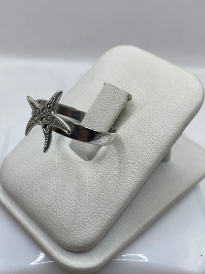 Anillo estrella de mar en plata .925 con detalle del grabado textural