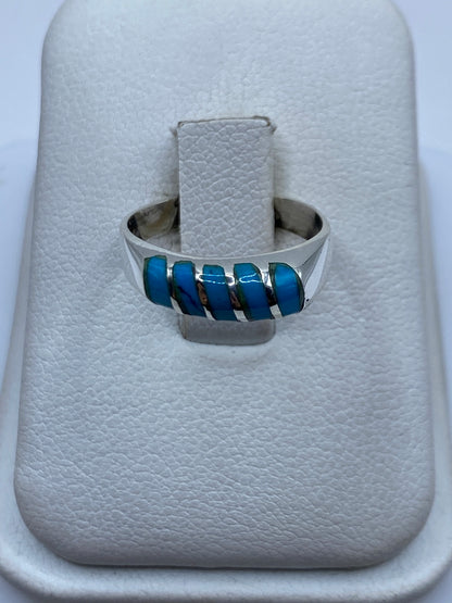 Anillo de plata .925 con piedra azul en estuche blanco de presentación