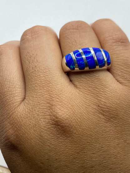 Anillo de plata Taxco con sello 950 visible, pesaje en báscula digital mostrando 12.5 gramos