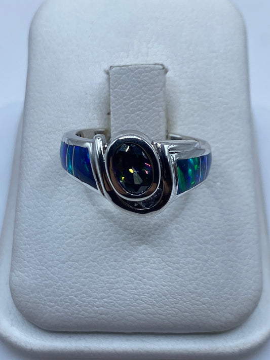 Anillo solitario con ópalo de fuego azul natural en plata .925