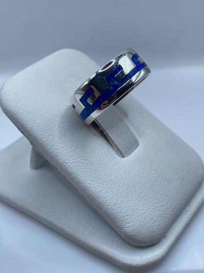 Ópalo de fuego azul engastado en plata .925, detalle del juego de colores