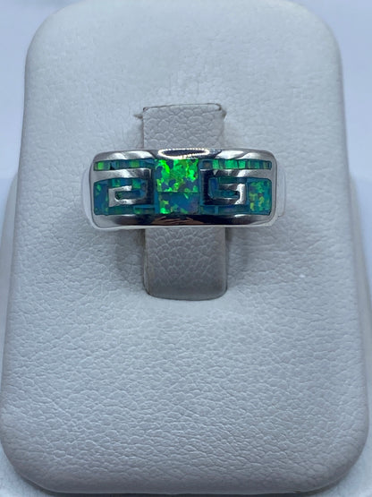 Anillo de plata .950 con ópalo de fuego azul cielo en diseño geométrico, vista frontal