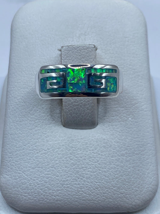 Anillo de plata .950 con ópalo de fuego azul cielo en diseño geométrico, vista frontal