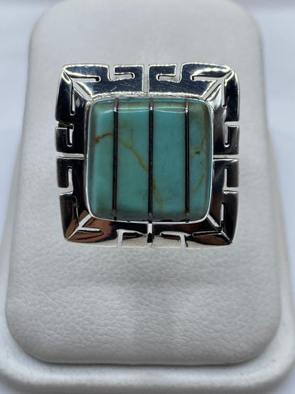 Anillo ajustable de plata con turquesa azul cielo en diseño geométrico étnico