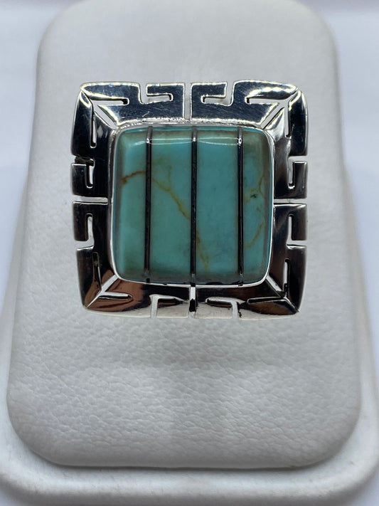 Anillo ajustable de plata con turquesa azul cielo en diseño geométrico étnico
