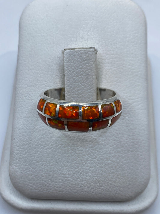 Anillo de plata .950 con ópalo de fuego naranja intenso en caja de presentación